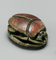 Scarab depicting a rearing ibex, Green glazed steatite